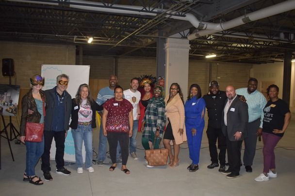 a group of people posing for a photo